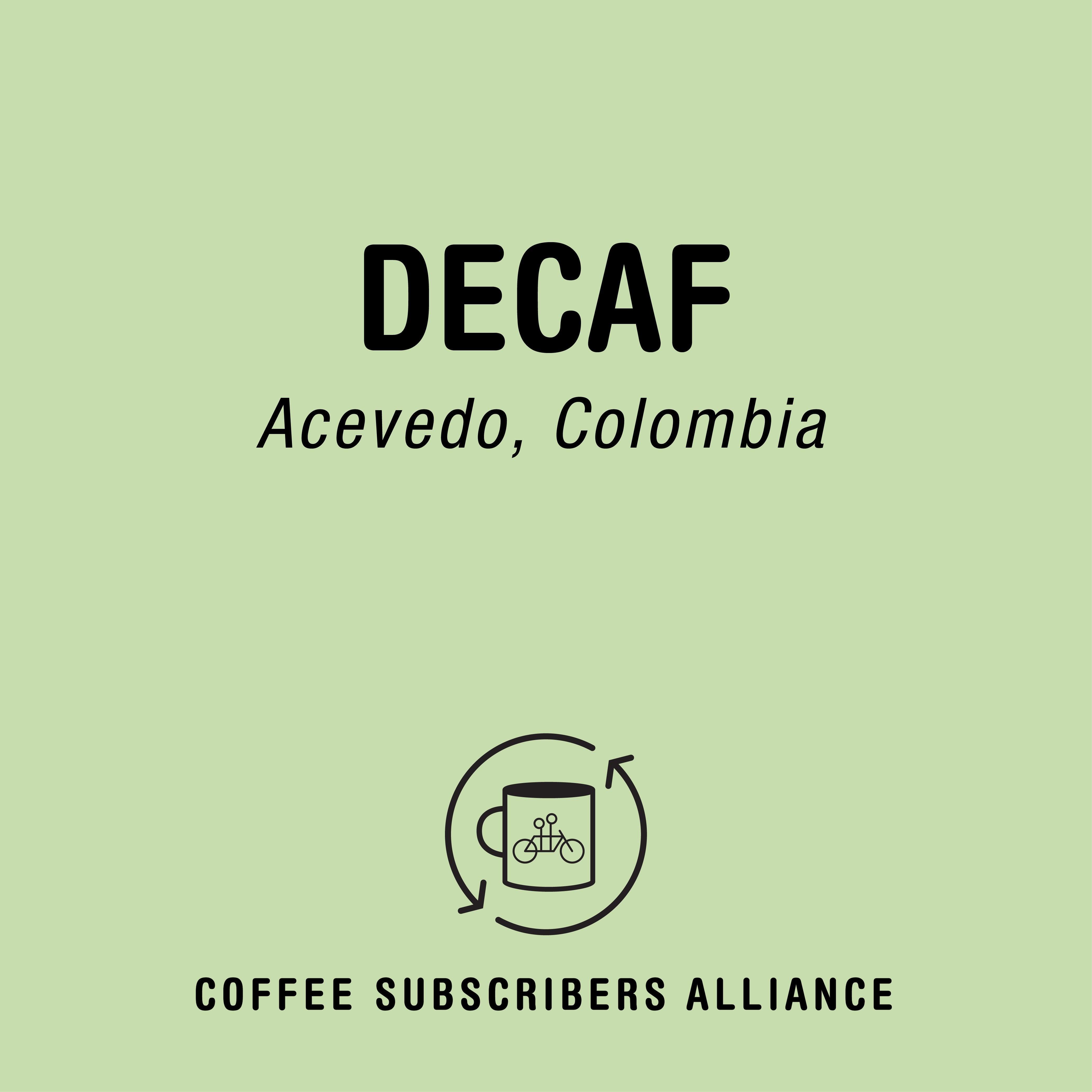 Image with a light green background displaying text in black that reads "DECAF, Acevedo, Colombia" in the center. Below this text is a circular icon of a coffee cup with swirling arrows around it. At the bottom, "TANDEM COFFEE ROASTERS" promotes their Decaf Gift Subscription.