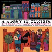 Album cover for "A Night in Tunisia" by Art Blakey's Jazz Messengers. It features colorful, stylized illustrations of buildings and people in traditional attire, reminiscent of the vibrant scenes from "Impressions." The title and artist's name are boldly displayed at the center, with the label "Tandem Coffee Roasters" in the top right corner.