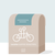A beige coffee bag with a minimalist design labeled "Olvin Moreno - Honduras." The bag features an illustration of a tandem bicycle and text indicating the coffee weight as 12 oz or 340 g. Highlighting unique coffees from expert coffee farmers under the brand name Tandem Coffee Roasters, the solid teal background creates a simple yet stylish look.