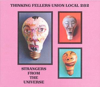 Album cover for Tandem Coffee Roasters' "Thinking Fellars Union Local 282 - Stranger From the Universe". Features three light bulbs with painted human faces against a pink background. The text "Tandem Coffee Roasters" is at the top, and "Thinking Fellars Union Local 282 - Stranger From the Universe" at the bottom—a visual treat for one of their greatest products.