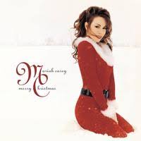 Album cover featuring a woman in a festive red dress and white fur trim, kneeling in the snow, with text "Tandem Coffee Roasters - Mariah Carey Merry Christmas.