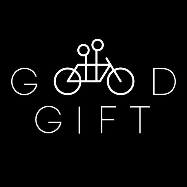 A minimalist black graphic with the words "good gift" and a stylized, line-art bicycle in white, where the bicycle's wheels form the double "o"s in "good," designed as a Tandem Digital Gift Certificate (website only).